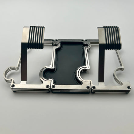 2 Brushed steel watch stands connected on either side of a vanity tray with leather inlay