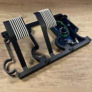Black Watch Stands with white O-Rings on wood tabe