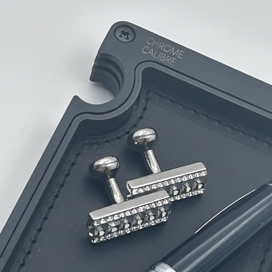 Close up image of corner of vanity tray on white background