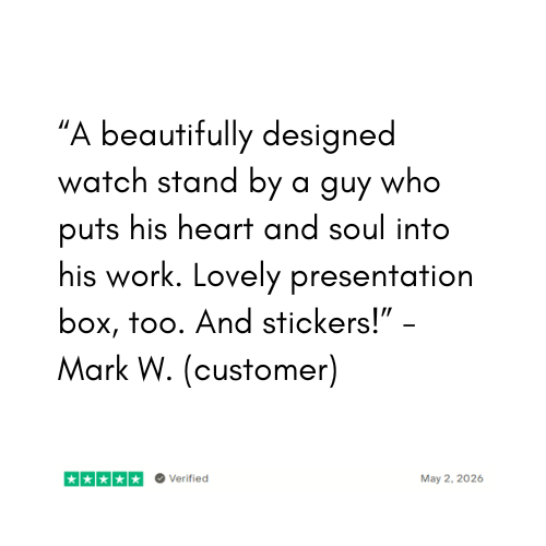 Customer review of a watch stand with text praising its design and packaging.