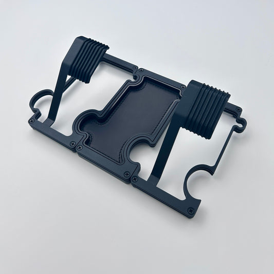 Black layered metal watch stand set with 2 stands and a vanity tray linked together.