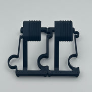 2 Black Matt watch stands on a white background