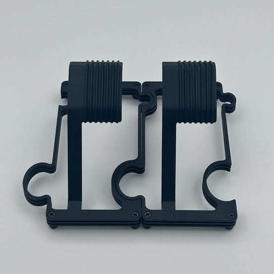 2 Black Matt watch stands on a white background