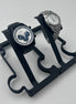 2 Puzzle watch stands in Black powder coated finish and a zenith and rolex watch sitting on them