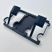 Black layered metal watch stand set with 2 stands and a vanity tray linked together.