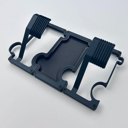 Black layered metal watch stand set with 2 stands and a vanity tray linked together.