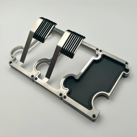 2 watch stands in brushed steel with a vanity tray also in steel