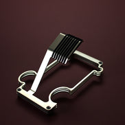 Brushed steel puzzle stand on red background