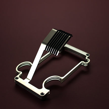 Brushed steel puzzle stand on red background