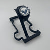 black metal watch stand with black watch on white background