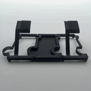 2 watch stands in black metal on either side of of a black vanity tray with black leather insert on white background