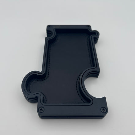 Puzzle Vanity Tray in layered black steel with black leather insert