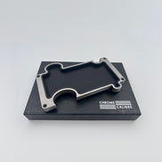 Metallic vanity tray on a black box with 'Chrome Calibre' branding