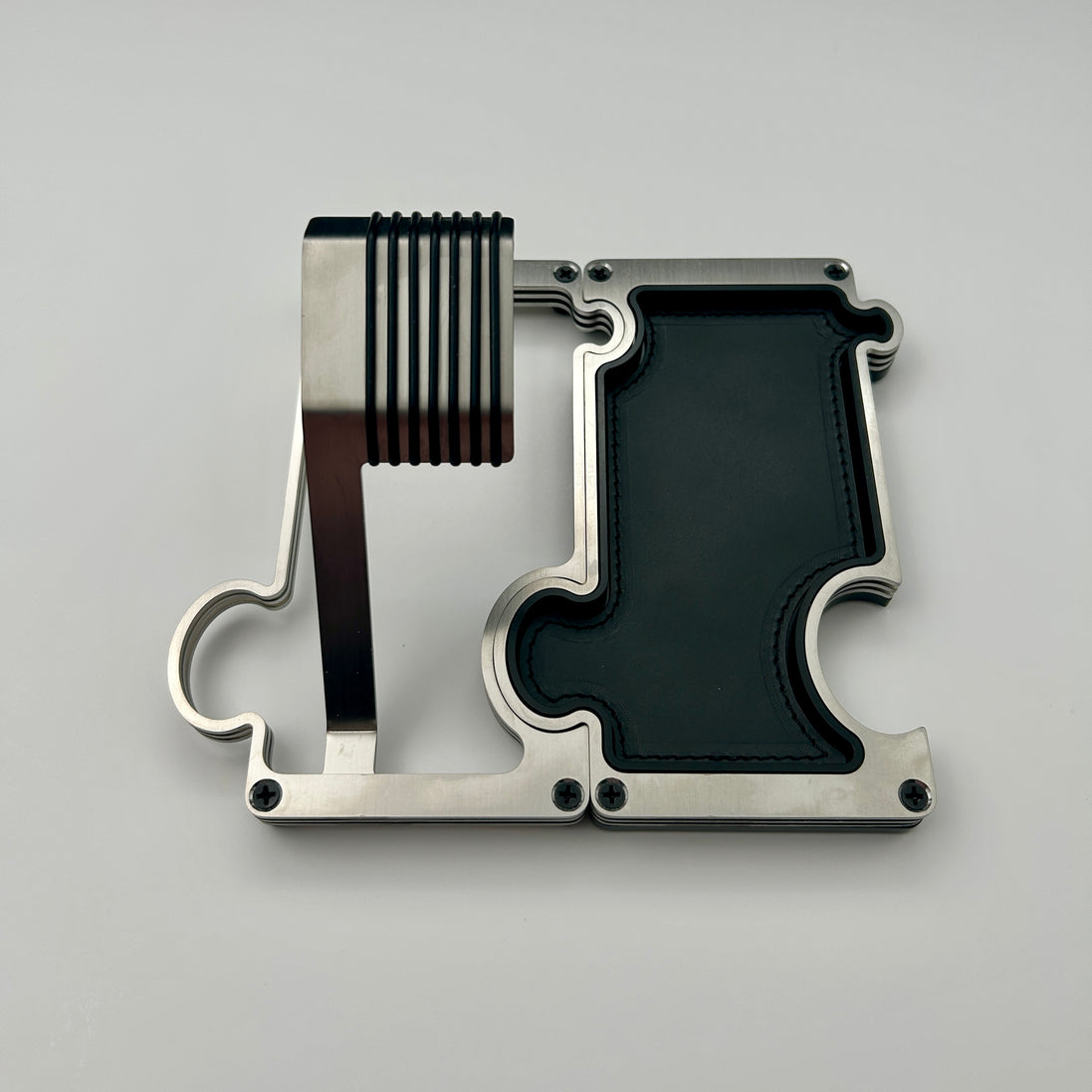 Puzzle Watch stand and vanity tray in brushed steel