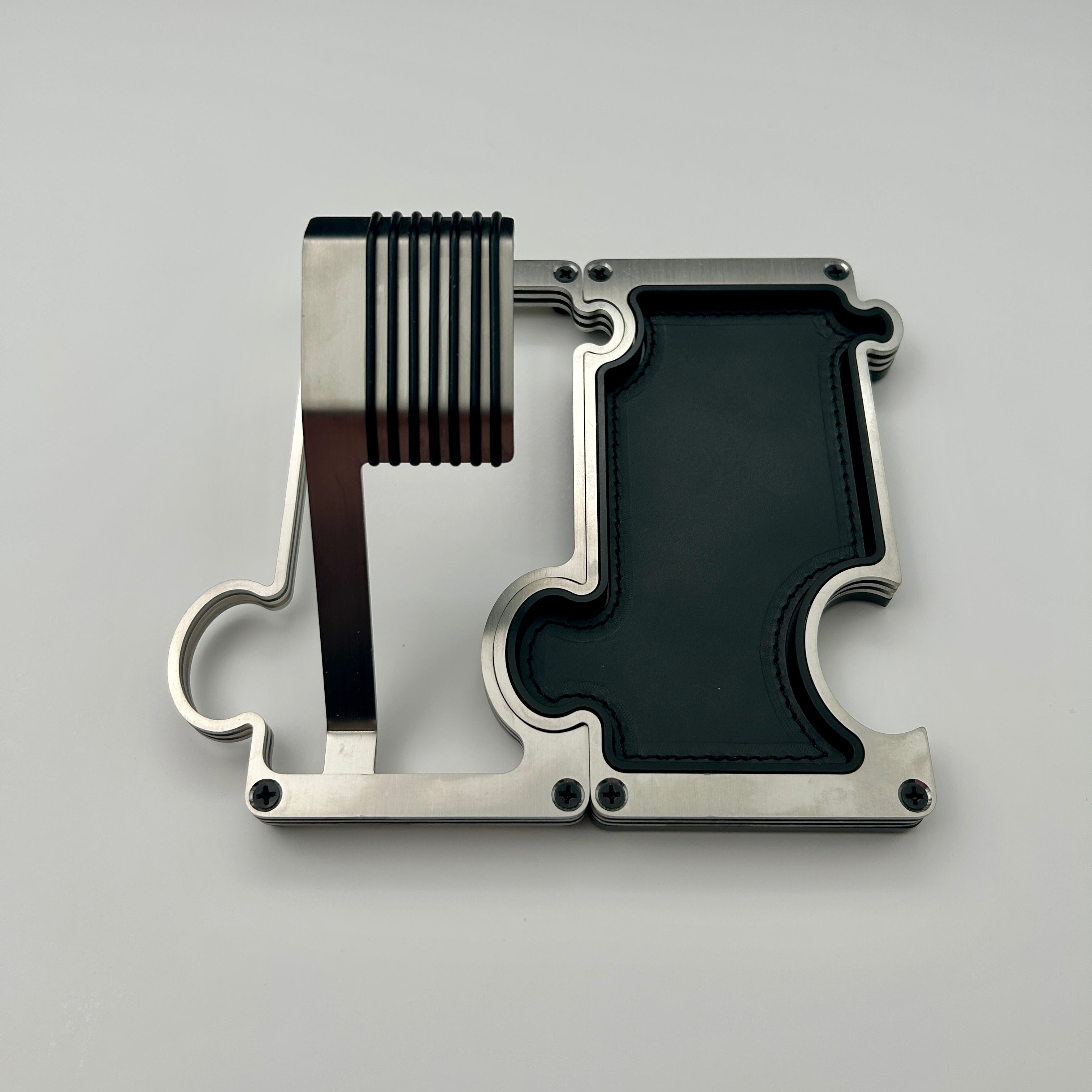 Puzzle Watch stand and vanity tray in brushed steel