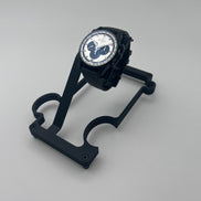 Black Metal stand with watch on white background