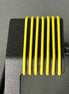 O-Ring n Yellow on a Black metal Watch Stand