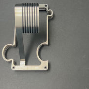 video of puzzle watch stand on grey surface showing the interlocking feature and adding a second stand