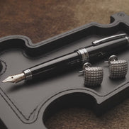 short clip of the Puzzle obsidian vanity try with pen and cufflinks
