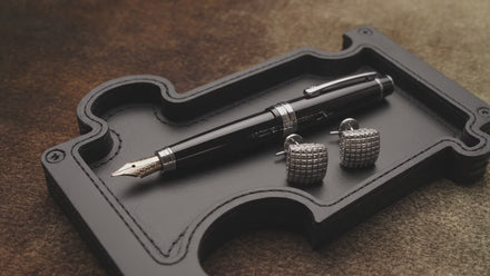 short clip of the Puzzle obsidian vanity try with pen and cufflinks
